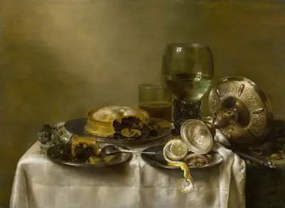 A still life with an overturned silver tazza, glassware, pies and a peeled lemon on a table av Willem Claesz Heda