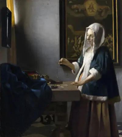 Woman Holding a Balance av Johannes Vermeer
