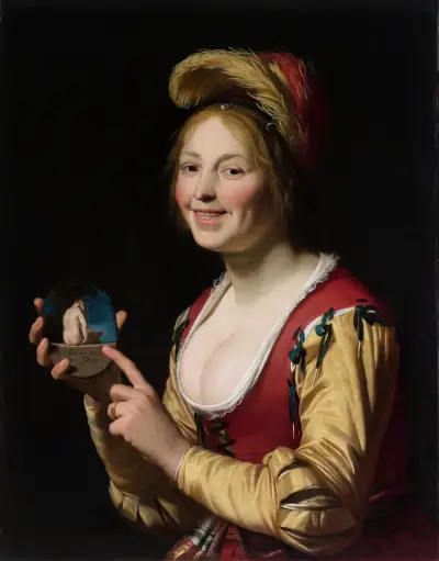 Smiling Girl, a Courtesan, Holding an Obscene Image von Gerard van Honthorst