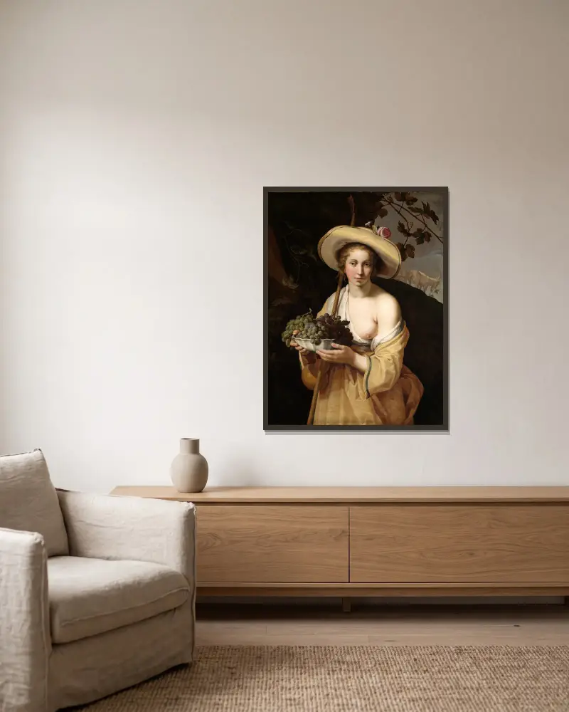 Herdinna med en skål druvor av Abraham Bloemaert inramad på en vägg