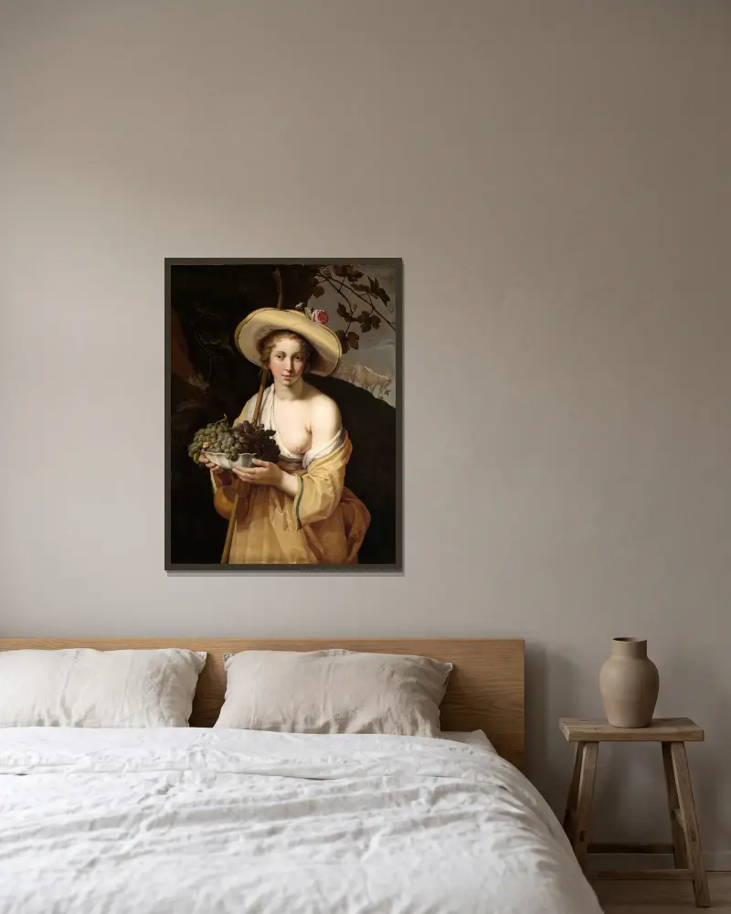 Herdinna med en skål druvor av Abraham Bloemaert inramad på en vägg