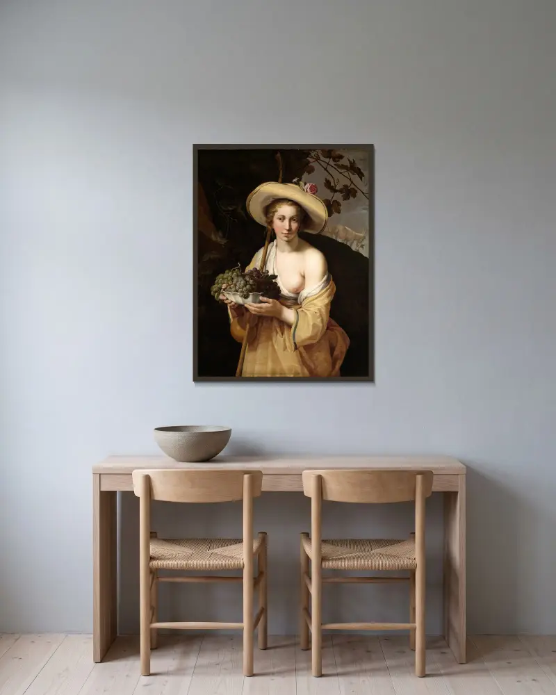 Herdinna med en skål druvor av Abraham Bloemaert inramad på en vägg