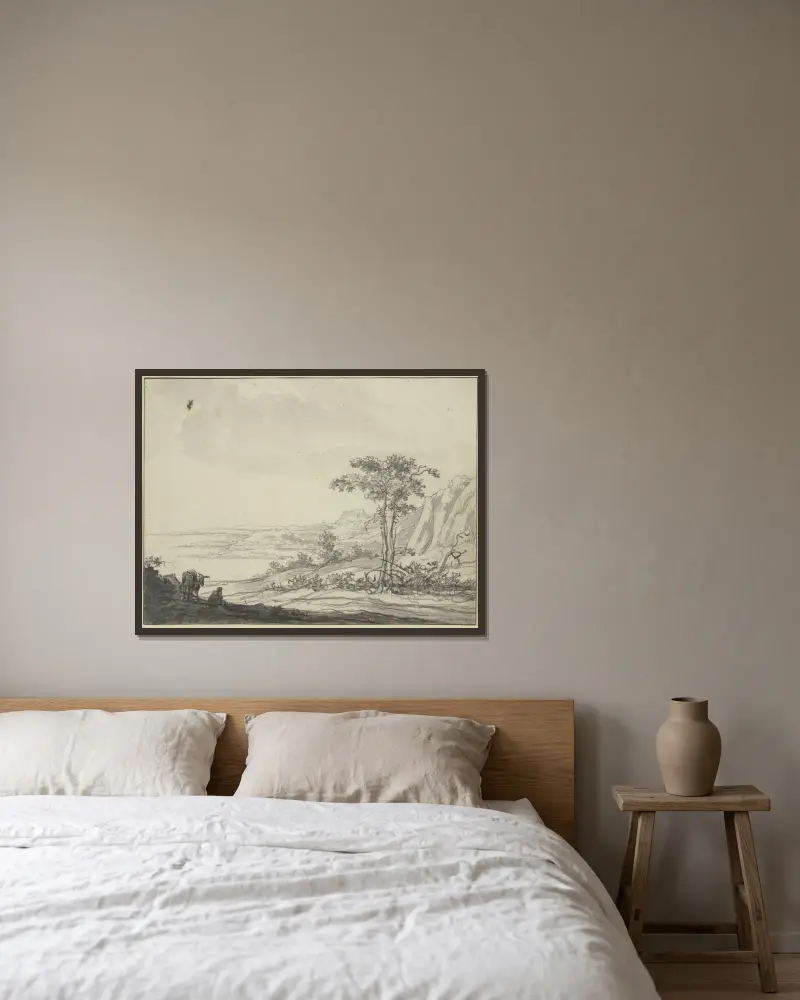 Bergslandskap vid havet, till vänster en sittande man vid en åsna av Aelbert Cuyp inramad på en vägg