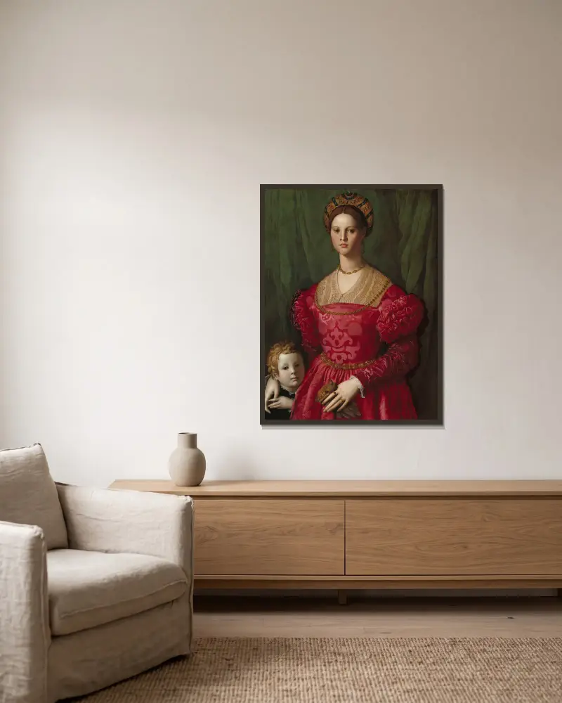 En ung kvinna och hennes lille son av Agnolo Bronzino inramad på en vägg