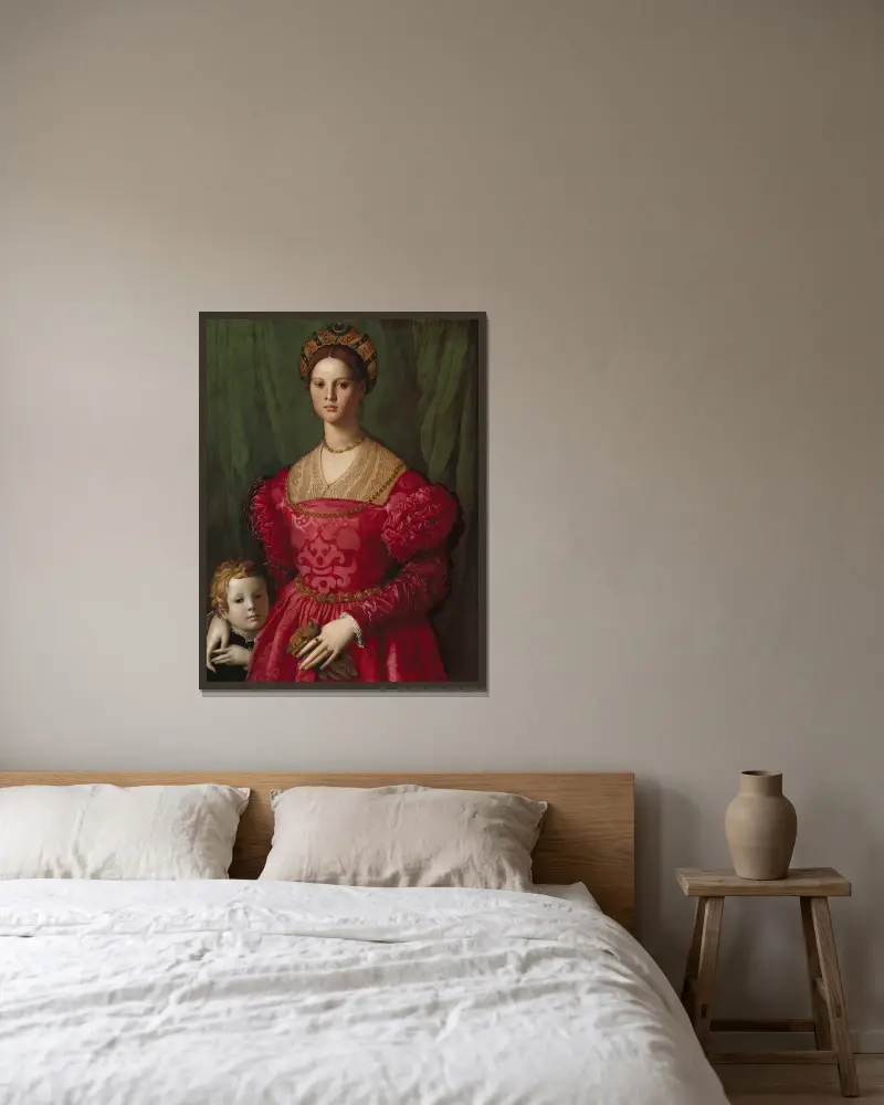 En ung kvinna och hennes lille son av Agnolo Bronzino inramad på en vägg