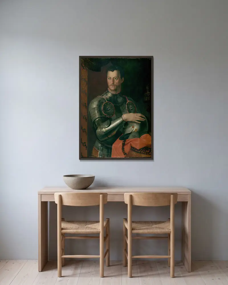 Cosimo I De’ Medici av Agnolo Bronzino inramad på en vägg