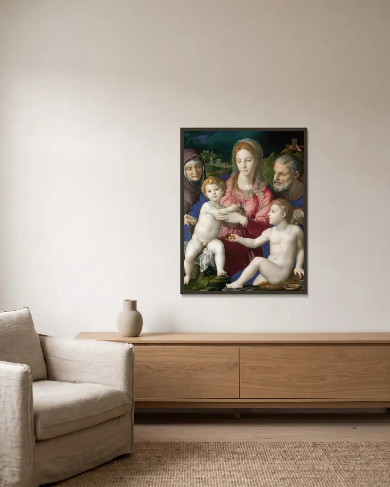 Den heliga familjen med den heliga Anna och den unge Johannes av Agnolo Bronzino inramad på en vägg