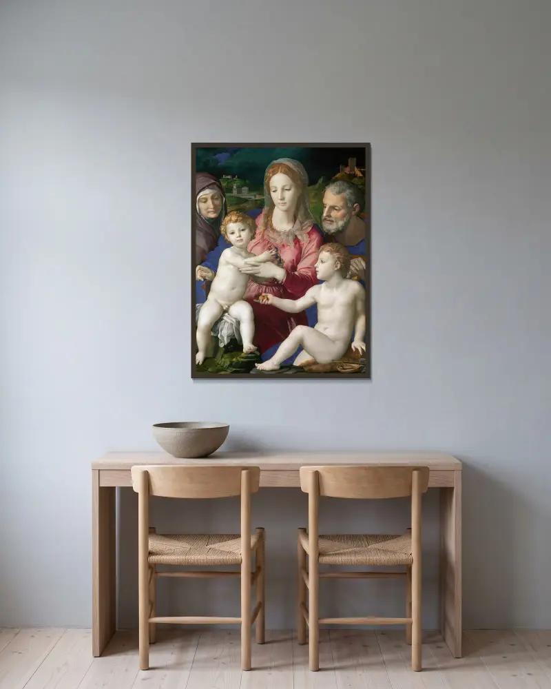 Den heliga familjen med den heliga Anna och den unge Johannes av Agnolo Bronzino inramad på en vägg