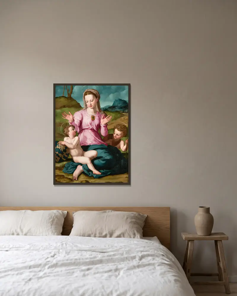 Madonna mit Kind und Johannes dem Täufer von Agnolo Bronzino gerahmt an einer Wand