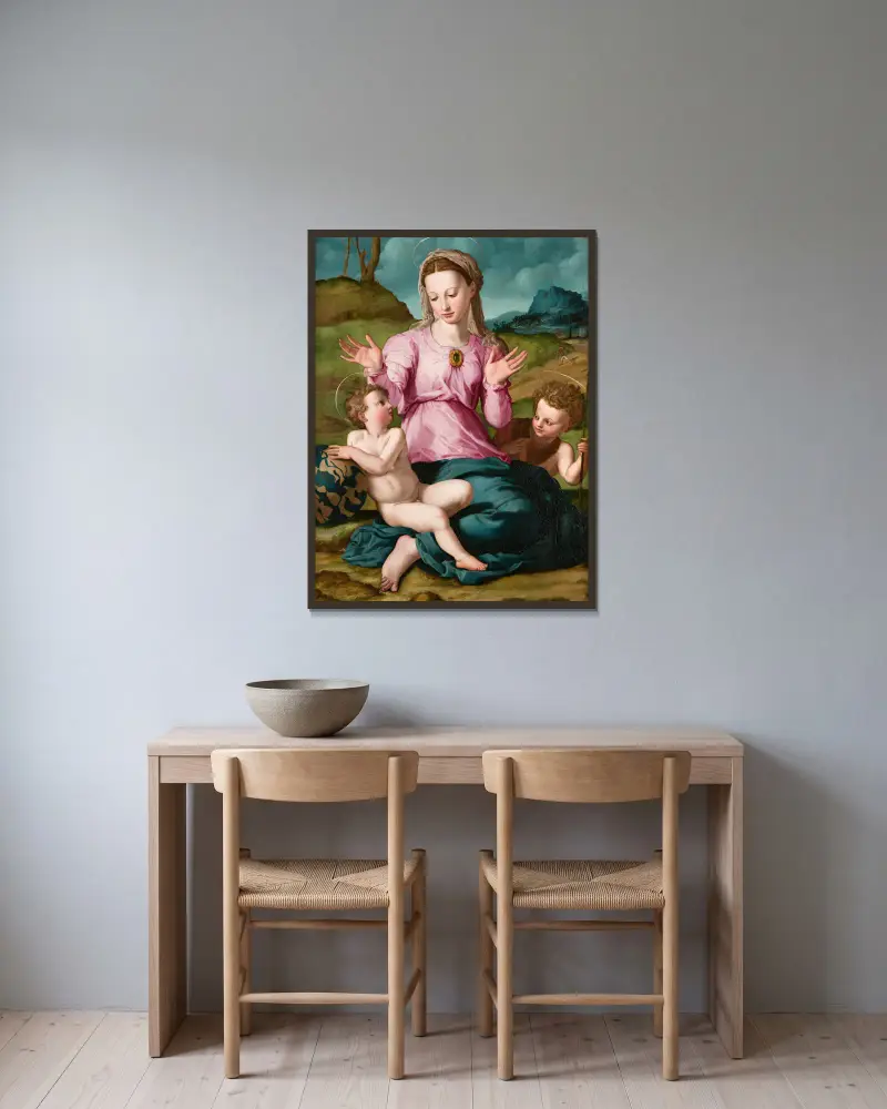 Madonna mit Kind und Johannes dem Täufer von Agnolo Bronzino gerahmt an einer Wand