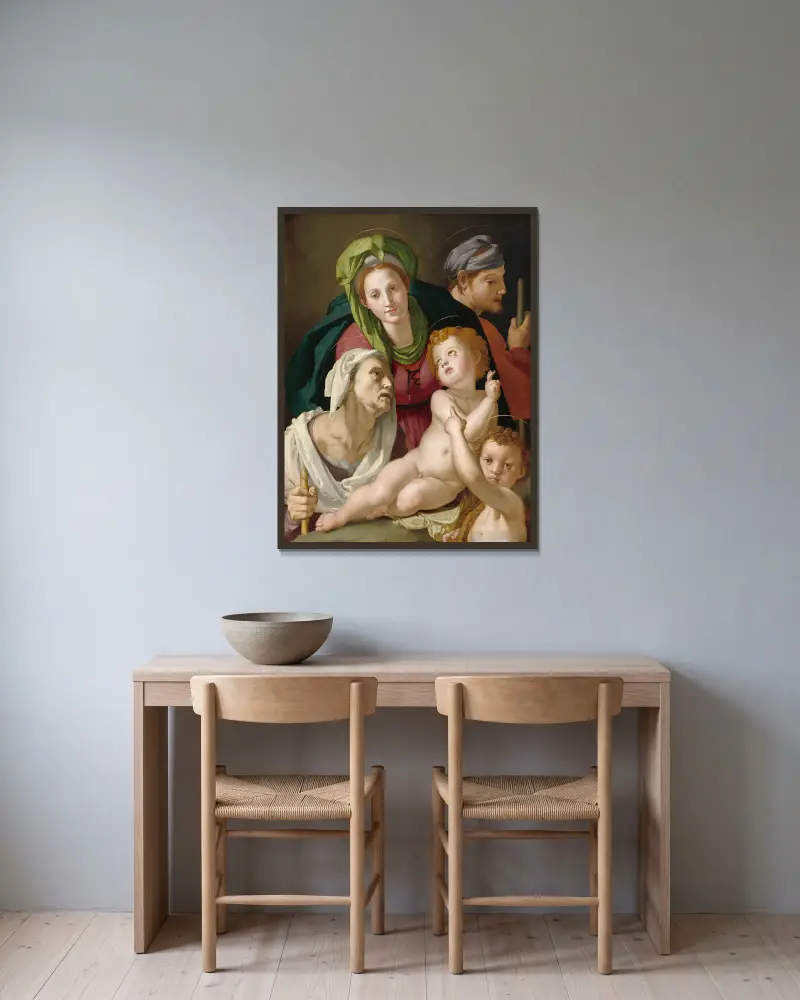 Den heliga familjen av Agnolo Bronzino inramad på en vägg