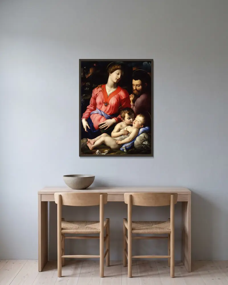 Den heliga familjen Panciatichi av Agnolo Bronzino inramad på en vägg