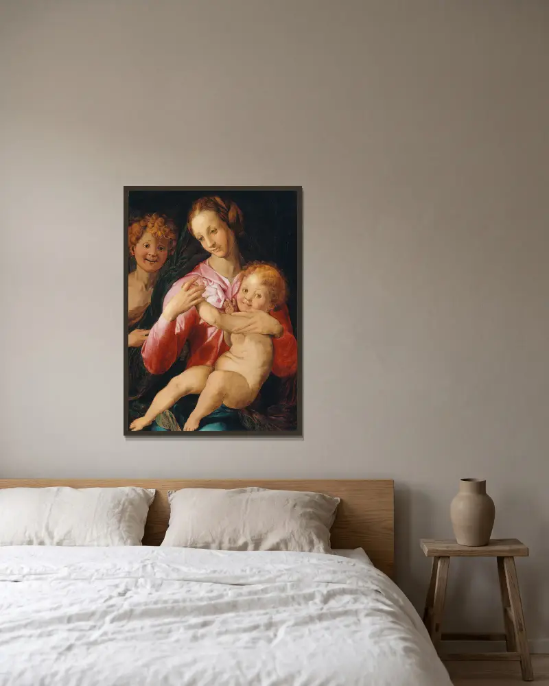 Madonnan med barnet och den unge Johannes Döparen av Agnolo Bronzino inramad på en vägg