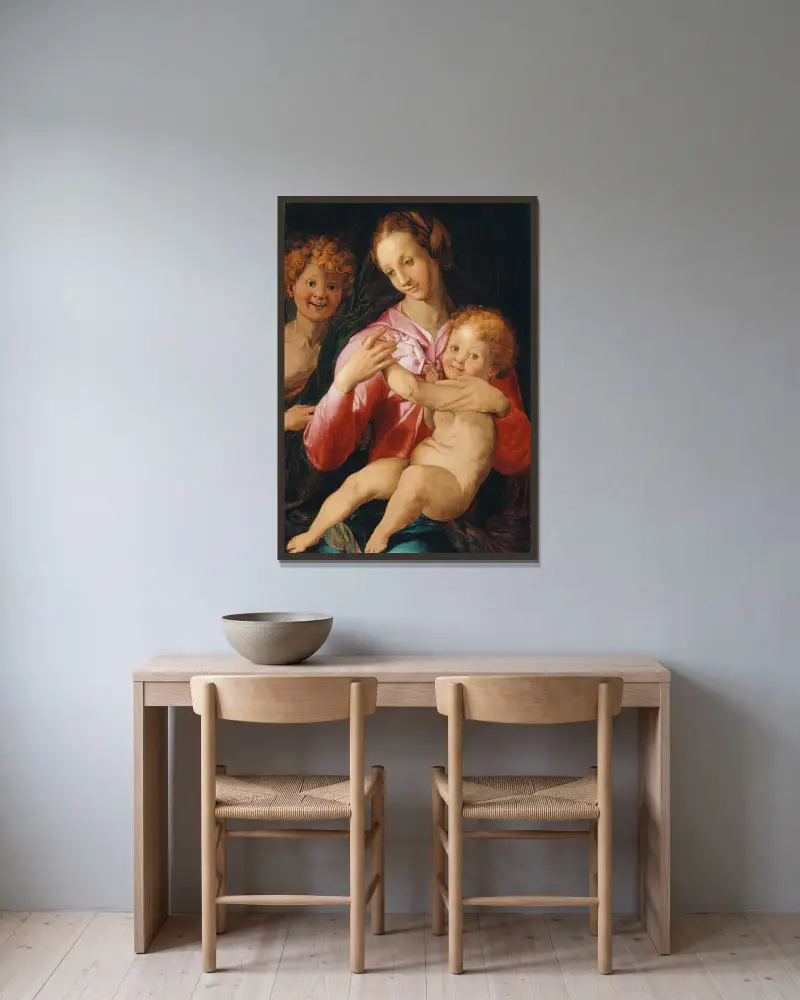 Madonnan med barnet och den unge Johannes Döparen av Agnolo Bronzino inramad på en vägg