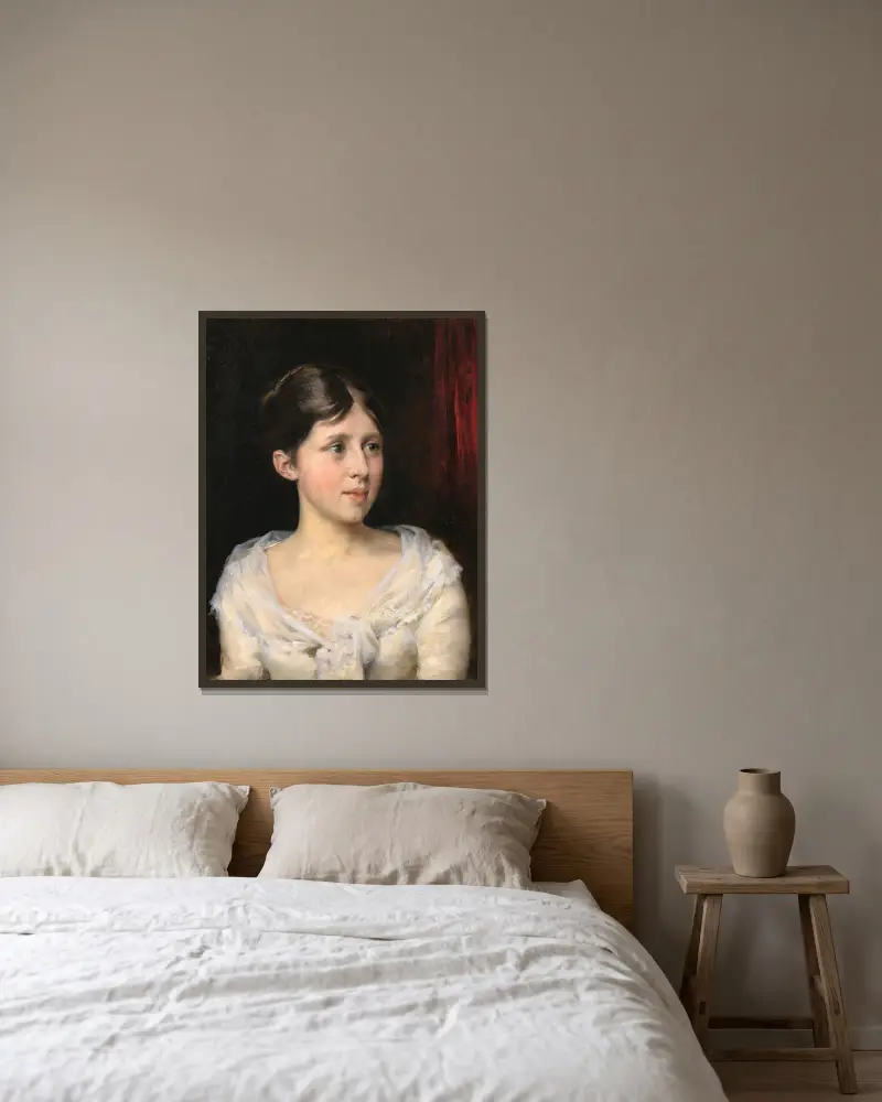 Flicka i vit klänning av Albert Edelfelt inramad på en vägg