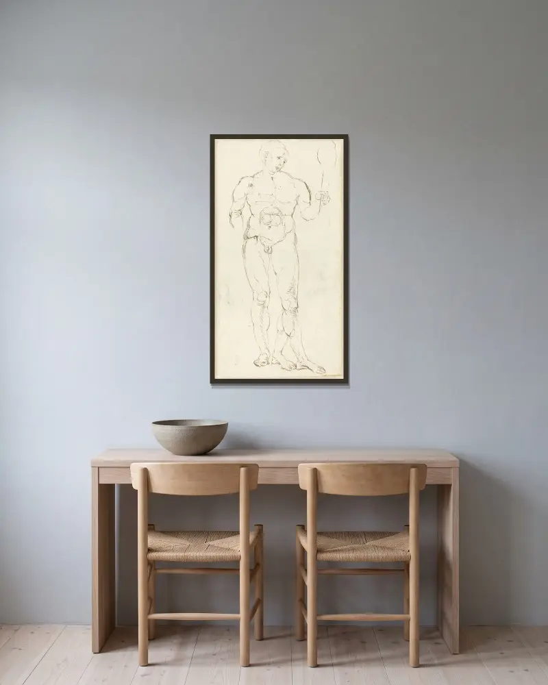 Manlig nakenfigur med spegel av Albrecht Dürer inramad på en vägg