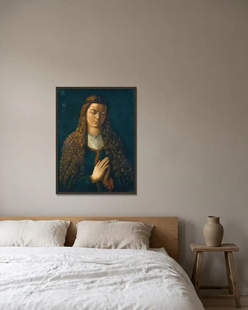 Porträtt av en ung kvinna med utsläppt hår av Albrecht Dürer inramad på en vägg