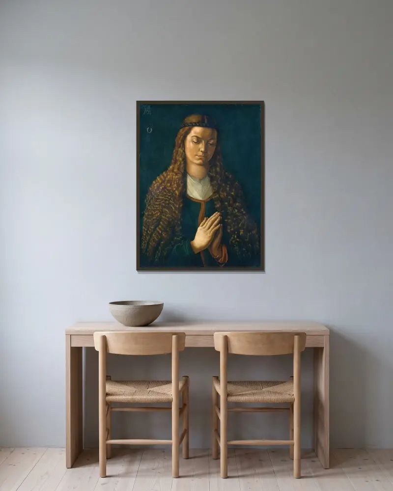 Porträtt av en ung kvinna med utsläppt hår av Albrecht Dürer inramad på en vägg