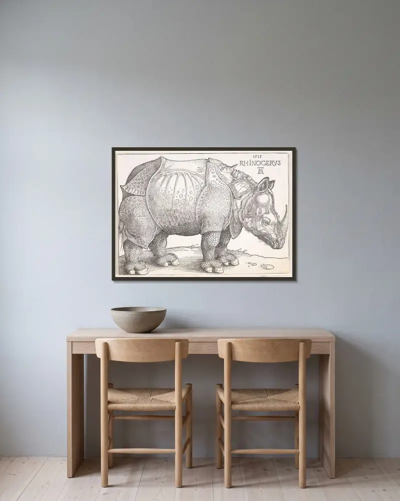 The rhinoceros, 1515 – nr 2 av Albrecht Dürer inramad på en vägg