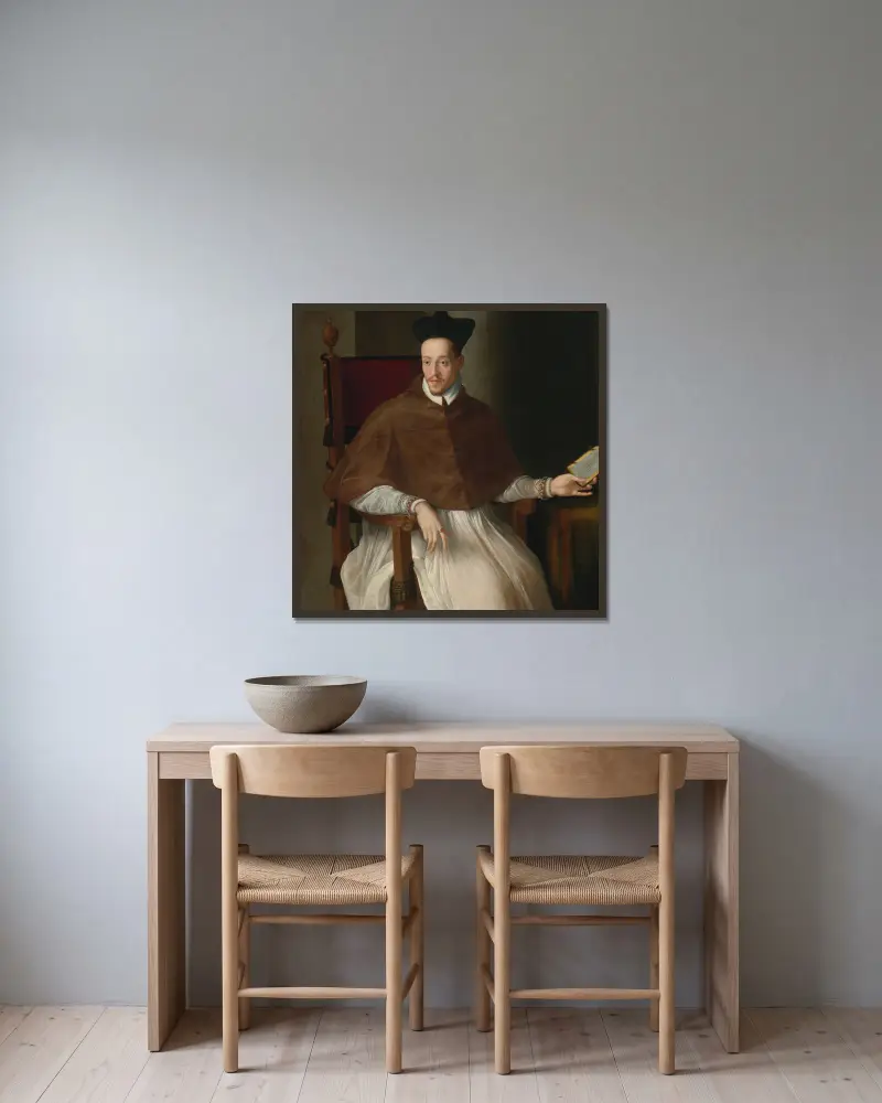 Bildnis eines Geistlichen von Alessandro Allori gerahmt an einer Wand