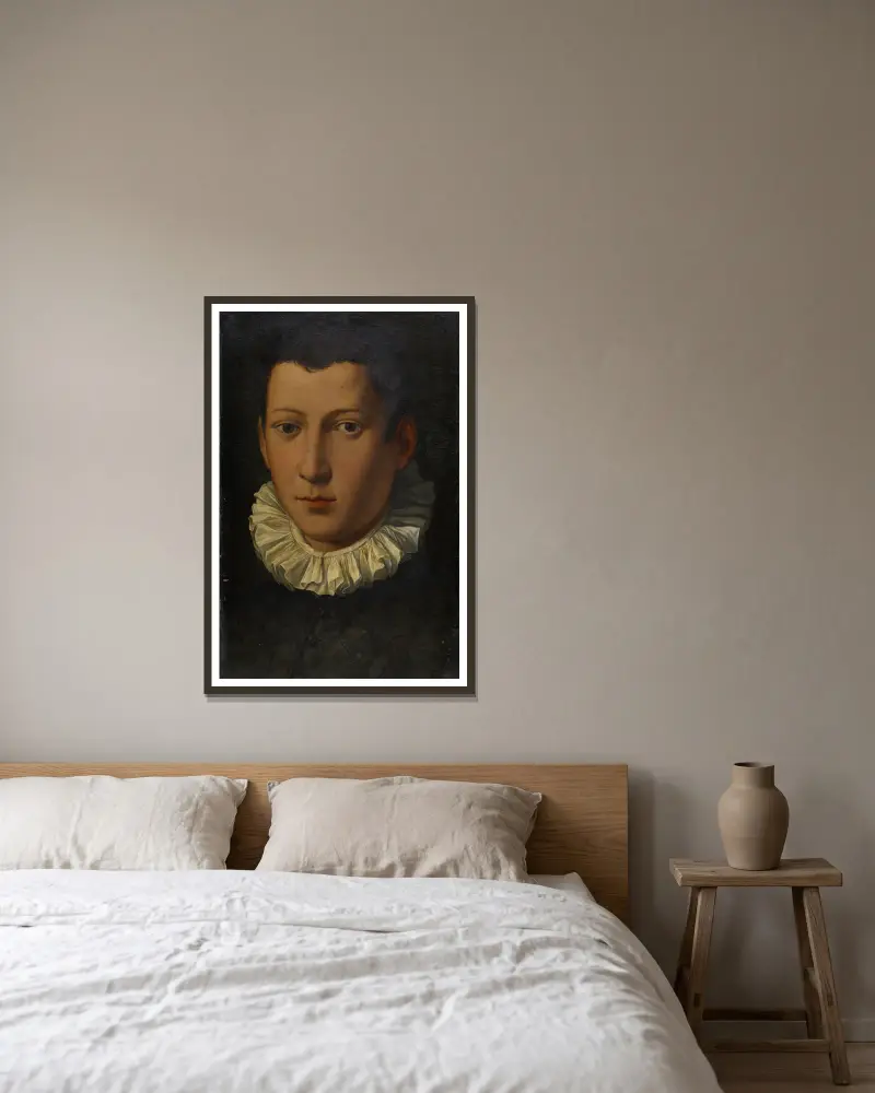 Porträtt av en ung man av Alessandro Allori inramad på en vägg