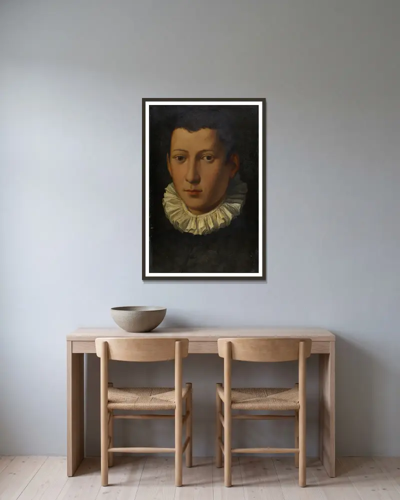 Porträtt av en ung man av Alessandro Allori inramad på en vägg
