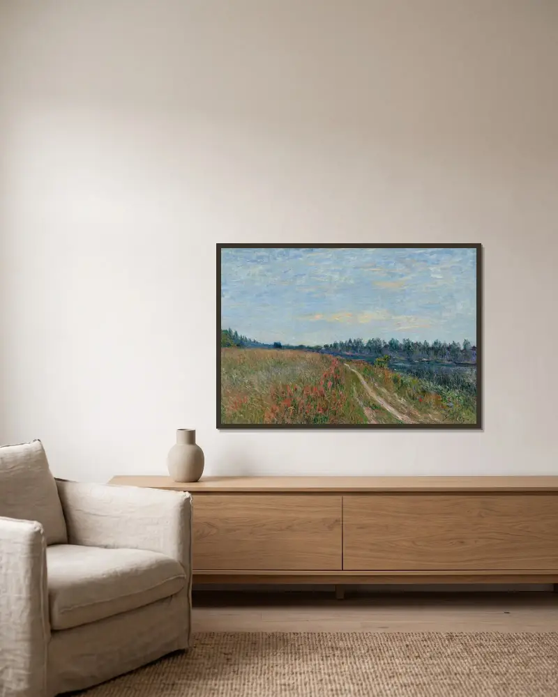 La prairie av Alfred Sisley inramad på en vägg