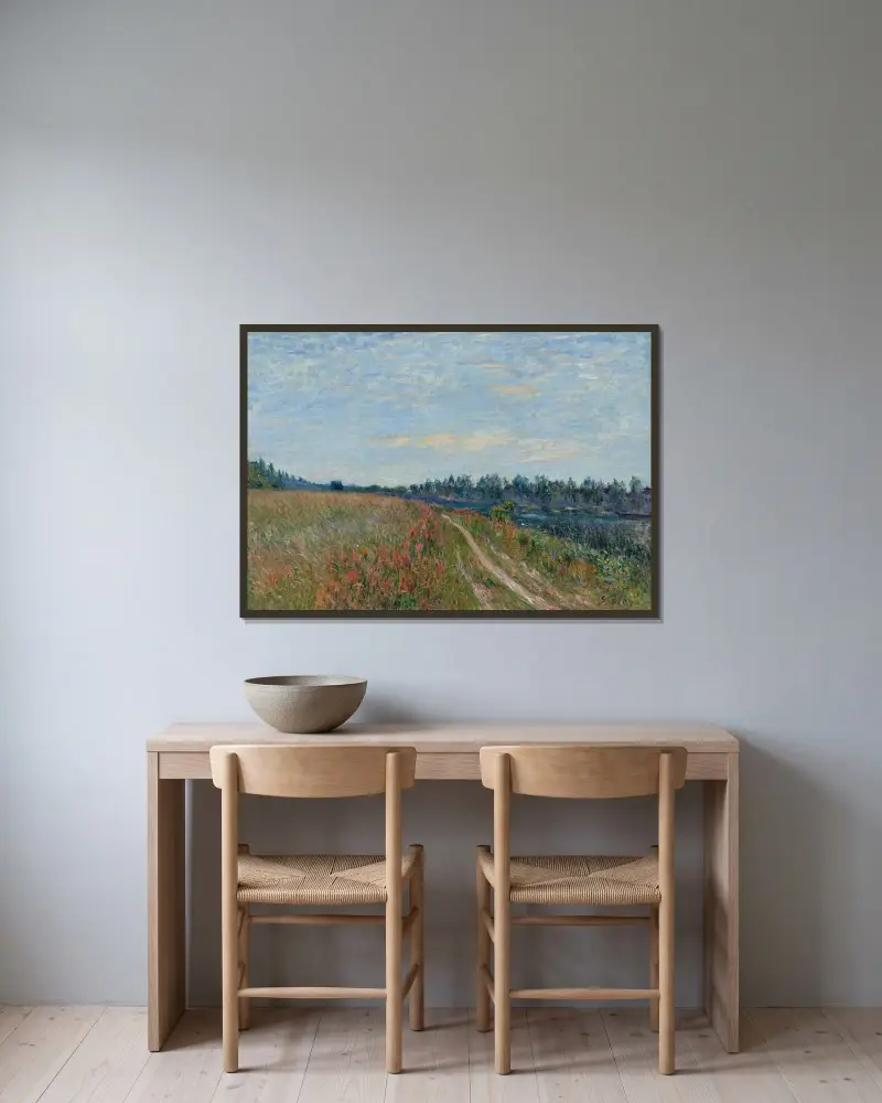 La prairie av Alfred Sisley inramad på en vägg