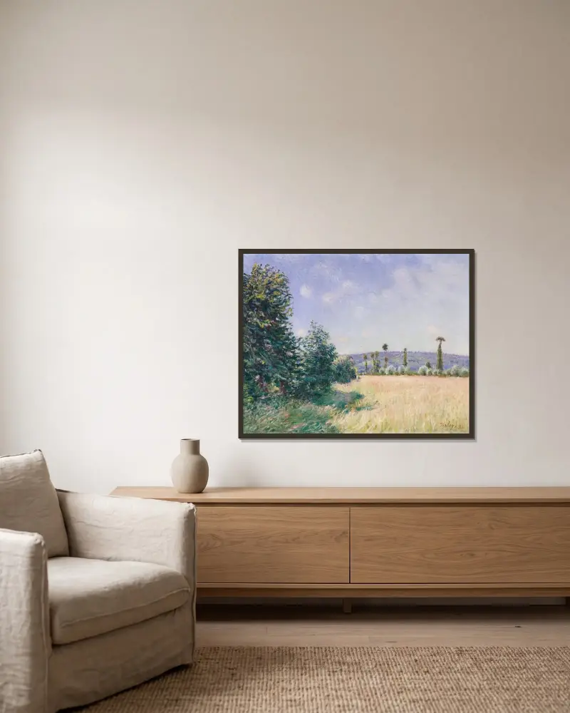 Sahurs ängar i morgonsol av Alfred Sisley inramad på en vägg