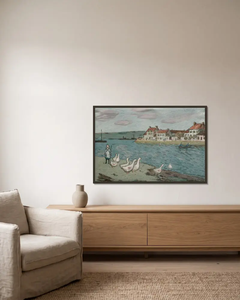 Das Flussufer oder Gänse von Alfred Sisley gerahmt an einer Wand