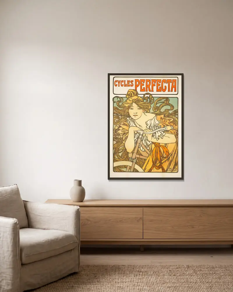 Cycles Perfecta av Alphonse Mucha inramad på en vägg