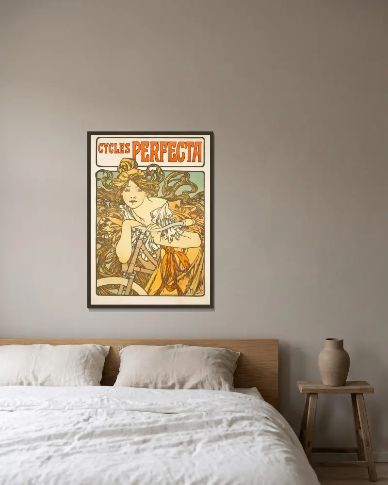 Cycles Perfecta av Alphonse Mucha inramad på en vägg