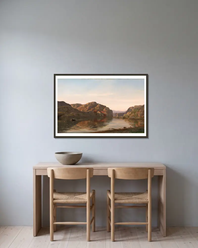 Morgon i Ny-Hellesund av Amaldus Nielsen inramad på en vägg