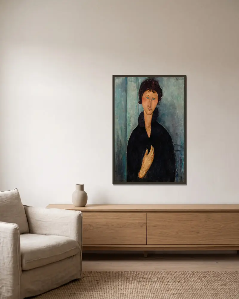 Kvinna med blå ögon av Amedeo Modigliani inramad på en vägg