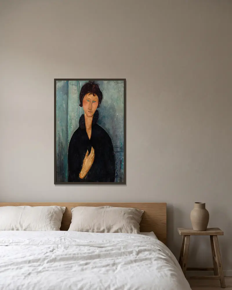 Kvinna med blå ögon av Amedeo Modigliani inramad på en vägg