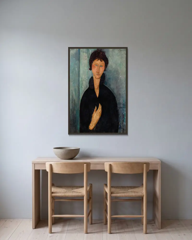 Kvinna med blå ögon av Amedeo Modigliani inramad på en vägg