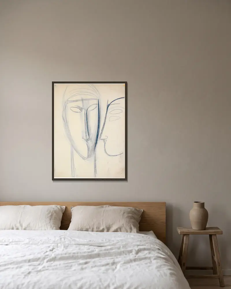 Frontalt långt ansikte och huvud i profil av Amedeo Modigliani inramad på en vägg