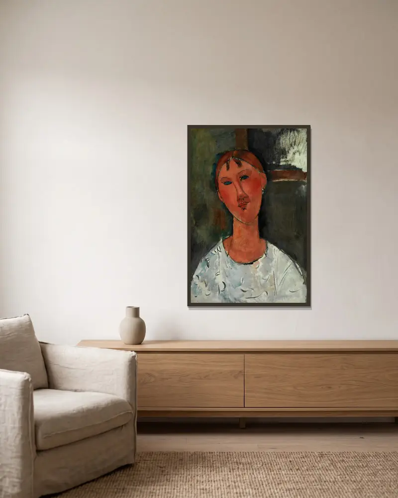 Flicka i vit blus av Amedeo Modigliani inramad på en vägg