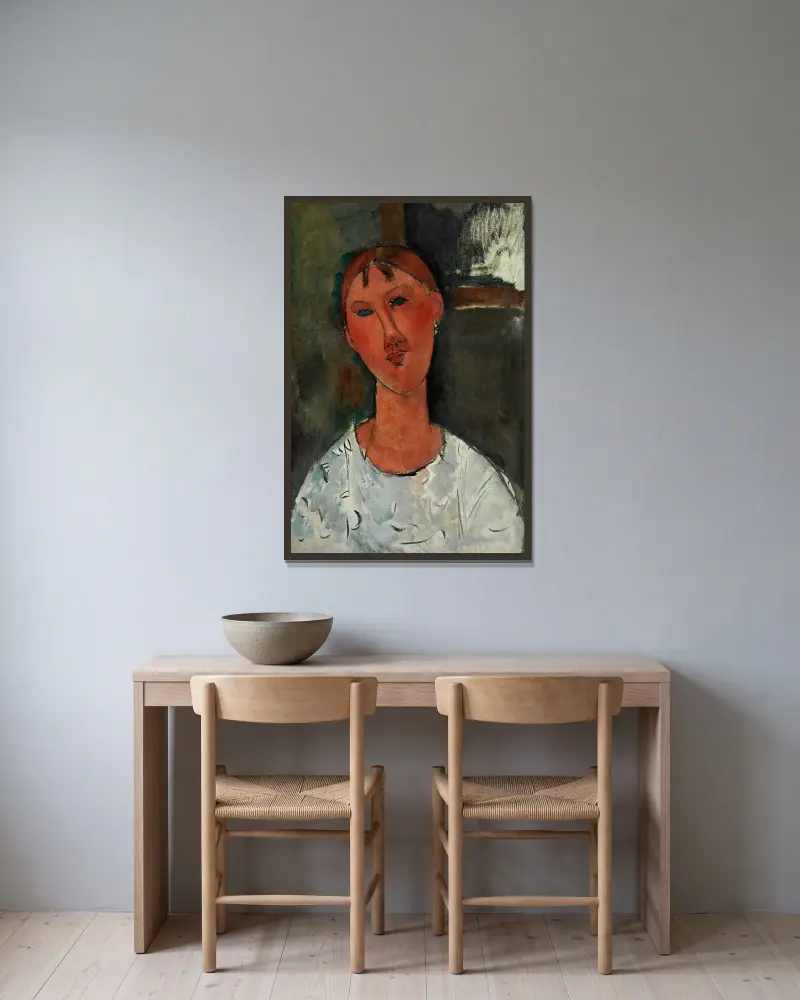 Flicka i vit blus av Amedeo Modigliani inramad på en vägg