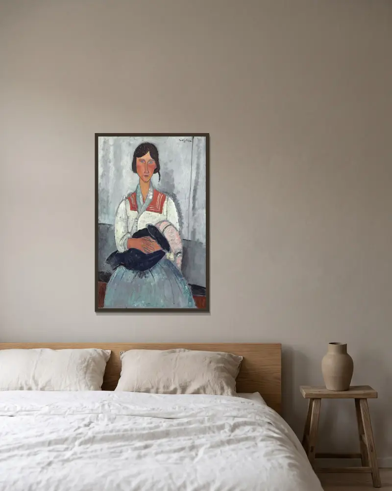 Zigenarkvinna med barn av Amedeo Modigliani inramad på en vägg