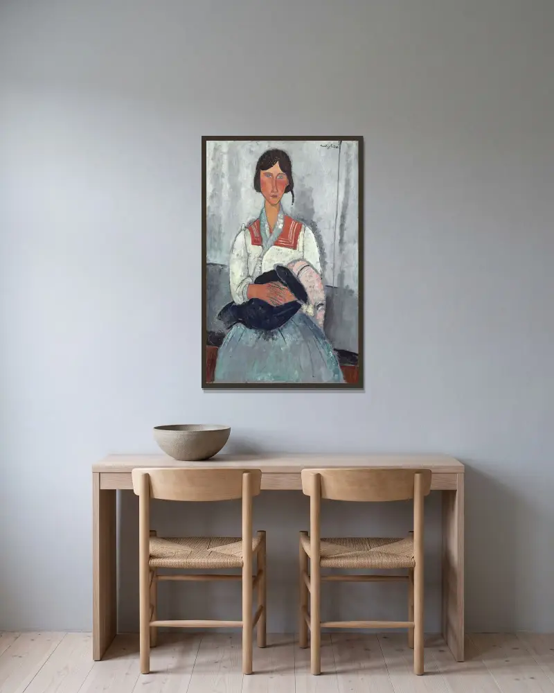 Zigenarkvinna med barn av Amedeo Modigliani inramad på en vägg