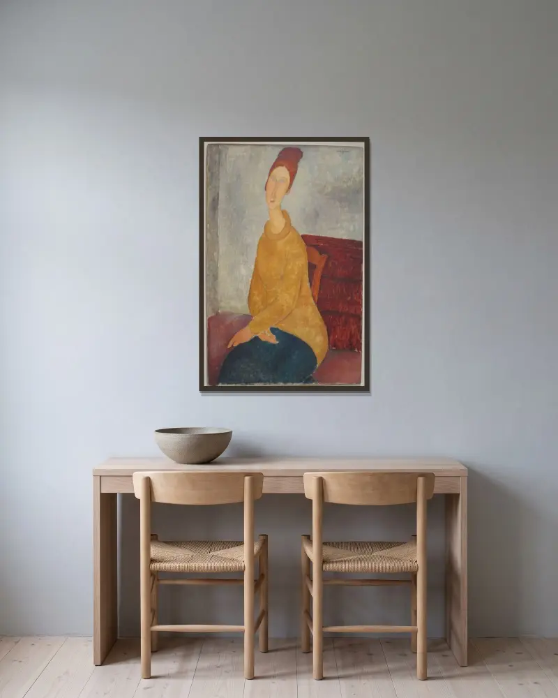 Jeanne Hébuterne i gul tröja av Amedeo Modigliani inramad på en vägg
