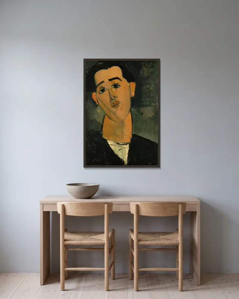Juan Gris av Amedeo Modigliani inramad på en vägg