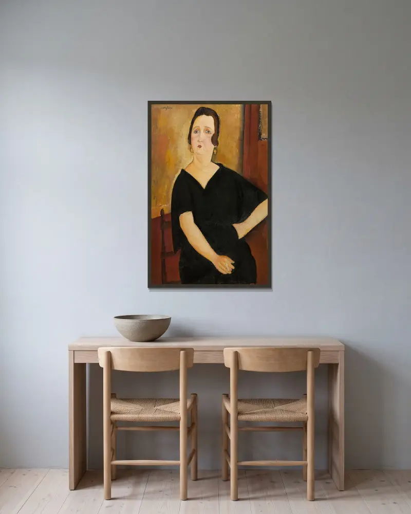 Madame Amédée (Frau mit Zigarette) von Amedeo Modigliani gerahmt an einer Wand