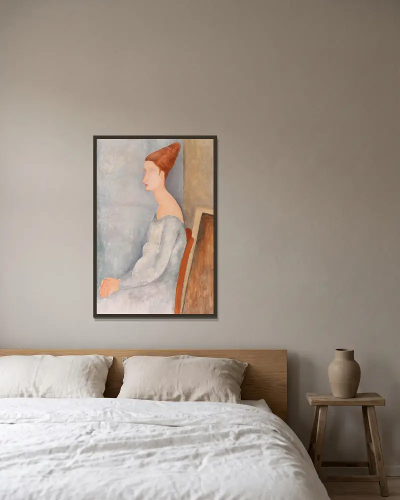 Bildnis der Jeanne Hébuterne, 1918 von Amedeo Modigliani gerahmt an einer Wand