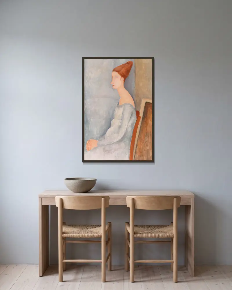 Bildnis der Jeanne Hébuterne, 1918 von Amedeo Modigliani gerahmt an einer Wand