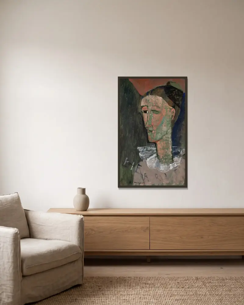 Self-Portrait as Pierrot av Amedeo Modigliani inramad på en vägg