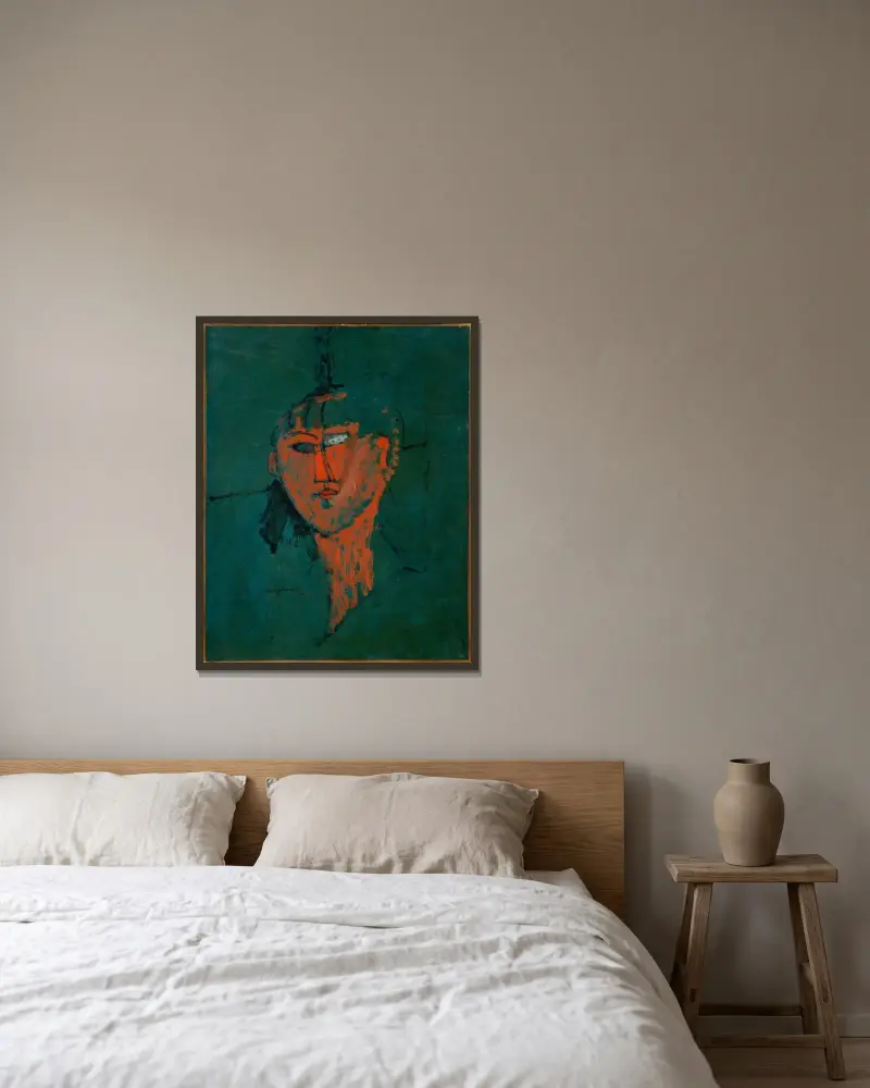 Roter Kopf von Amedeo Modigliani gerahmt an einer Wand