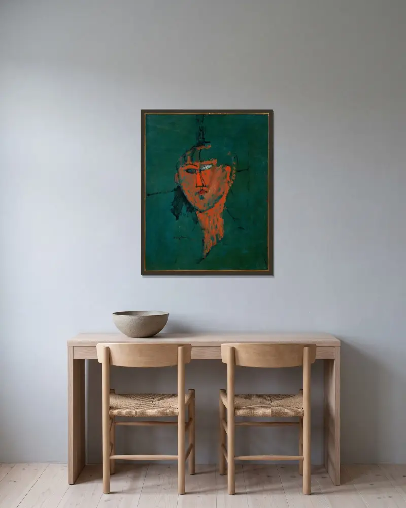 Roter Kopf von Amedeo Modigliani gerahmt an einer Wand