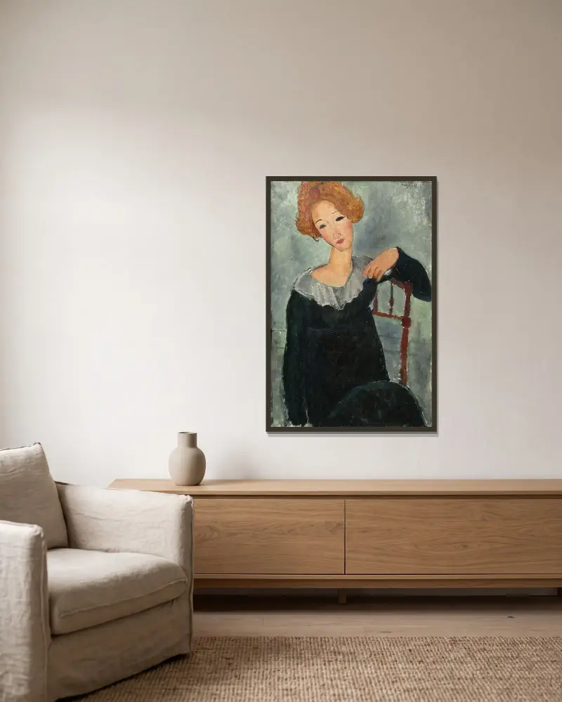 Kvinna med rött hår av Amedeo Modigliani inramad på en vägg
